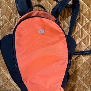 Lululemon Fast & Free 13L Backpack in Orange and Black